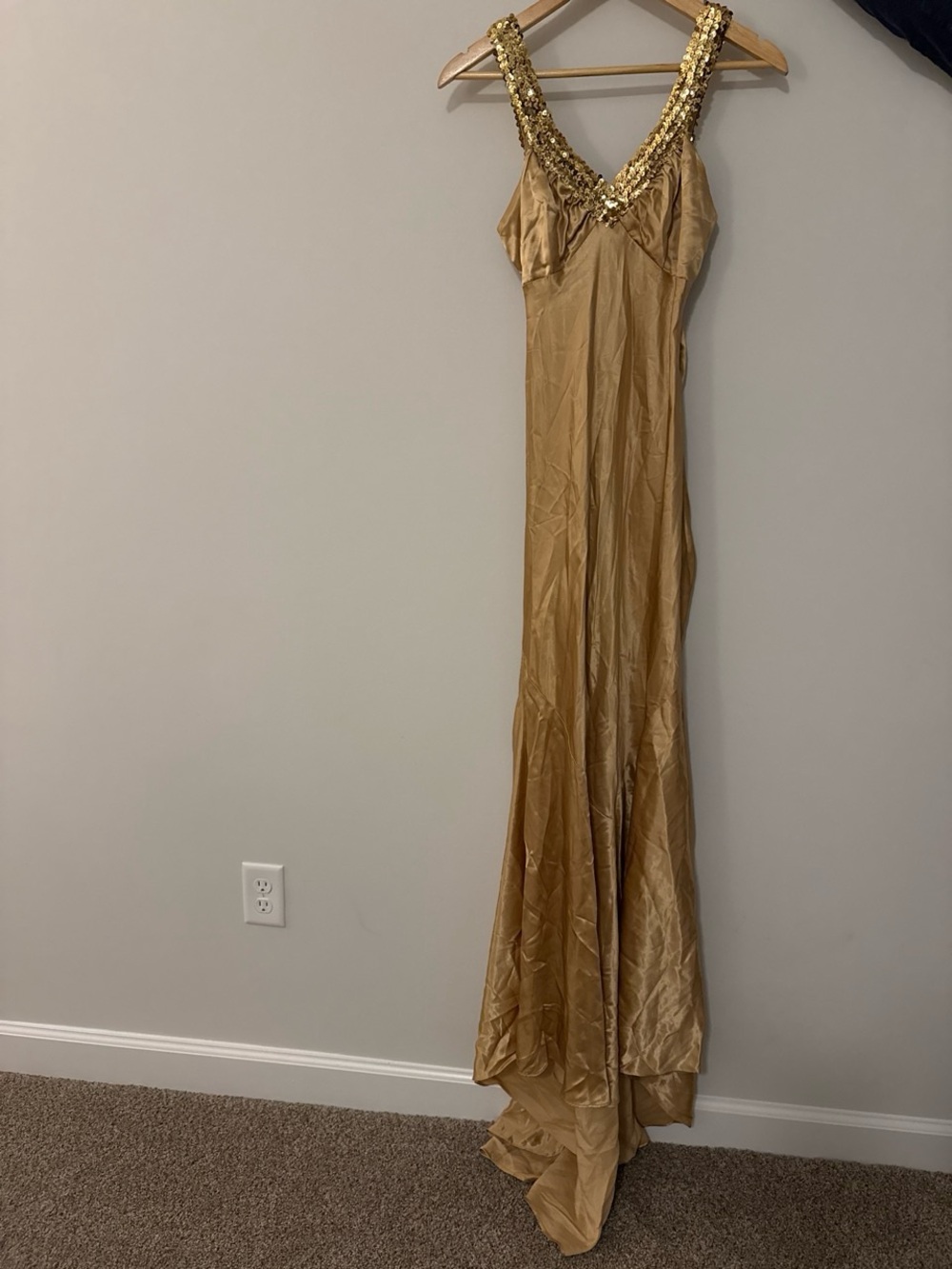 Women’s gold satin sequin-trim formal gown, low back.
